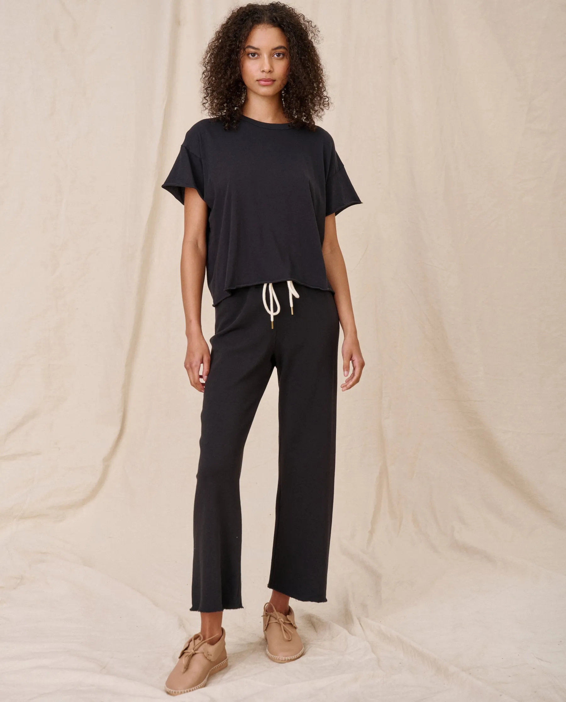 The Wide Leg Cropped Sweatpant. -- Almost Black